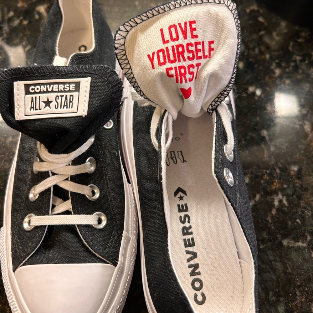 Converse  All Stars Black and white sneakers w/ red heart accents